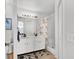 Clean bathroom with double vanity, shower, and updated fixtures at 2216 Mystic Ring Loop, Poinciana, FL 34759
