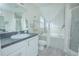 Modern bathroom with soaking tub, walk-in shower, and updated vanity at 2649 Sunset Cir, Lake Wales, FL 33898