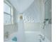 Relaxing bathroom with a soaking tub and decorative wall at 2649 Sunset Cir, Lake Wales, FL 33898