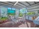 Outdoor kitchen and dining area with brick patio at 2649 Sunset Cir, Lake Wales, FL 33898