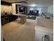 Entertainment area with bar, TV, and comfortable seating at 2737 Nottel Dr, Saint Cloud, FL 34772