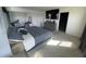 Spacious main bedroom with large bed, TV, and ensuite bathroom access at 2737 Nottel Dr, Saint Cloud, FL 34772