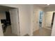 Hallway with doors to bedrooms and a bathroom at 2737 Nottel Dr, Saint Cloud, FL 34772
