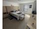 Bedroom with a large bed and unique headboard at 2737 Nottel Dr, Saint Cloud, FL 34772