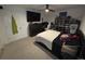 Spacious bedroom with large bed, dresser, and TV at 2737 Nottel Dr, Saint Cloud, FL 34772