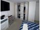Large walk-in closet with Versace-themed design at 2737 Nottel Dr, Saint Cloud, FL 34772