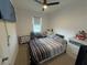 Comfortable bedroom with TV and ample closet space at 2737 Nottel Dr, Saint Cloud, FL 34772