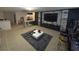 Game room with bar, TV, and comfortable seating at 2737 Nottel Dr, Saint Cloud, FL 34772