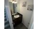 Small bathroom with single vanity and toilet at 2737 Nottel Dr, Saint Cloud, FL 34772