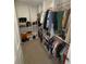 Large walk-in closet with ample shelving and hanging space at 2737 Nottel Dr, Saint Cloud, FL 34772