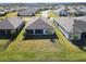 Aerial view showing home's location and backyard lake view at 445 Via Abruzzi St, Poinciana, FL 34759