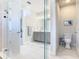 Spacious bathroom with double vanity, toilet, and shower at 445 Via Abruzzi St, Poinciana, FL 34759