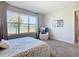 Bedroom with water views and a comfy armchair at 445 Via Abruzzi St, Poinciana, FL 34759