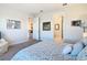 Bedroom with access to bathroom and living room at 445 Via Abruzzi St, Poinciana, FL 34759