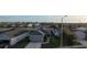 An aerial view showcasing a house's exterior, driveway, and surrounding neighborhood at 502 Pentas Ln, Haines City, FL 33844