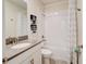 Clean bathroom with a tub, shower, and gray countertop at 712 Whistling Straits Blvd, Davenport, FL 33896