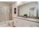 Modern bathroom with double vanity, shower, and toilet at 712 Whistling Straits Blvd, Davenport, FL 33896