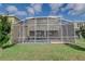 Screened-in pool and patio area, perfect for outdoor enjoyment at 712 Whistling Straits Blvd, Davenport, FL 33896
