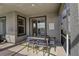 Covered patio with dining table and chairs at 712 Whistling Straits Blvd, Davenport, FL 33896
