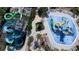 Aerial view of water park with slides and a splash pad at 712 Whistling Straits Blvd, Davenport, FL 33896