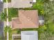 Aerial view of house and surrounding yard at 141 Marabella Loop, Poinciana, FL 34759