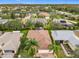 Aerial view showcasing the home's location within a residential community at 141 Marabella Loop, Poinciana, FL 34759