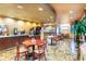 Community cafe with tables, chairs, and drink machines at 141 Marabella Loop, Poinciana, FL 34759