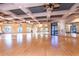 Spacious dance studio with wood floors and mirrors at 141 Marabella Loop, Poinciana, FL 34759