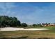 Picturesque golf course with sand traps and a beautiful view at 141 Marabella Loop, Poinciana, FL 34759
