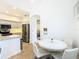 Bright kitchen features a breakfast nook and stainless steel appliances at 141 Marabella Loop, Poinciana, FL 34759