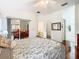 Main bedroom with access to the sitting area and bathroom at 141 Marabella Loop, Poinciana, FL 34759