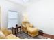 Cozy sitting area with comfortable seating and a view at 141 Marabella Loop, Poinciana, FL 34759