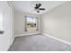 Cozy bedroom with ceiling fan and carpet flooring at 2108 Lemon St, Haines City, FL 33844