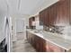 Modern kitchen with granite countertops and dark wood cabinets at 2108 Lemon St, Haines City, FL 33844