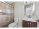Clean bathroom with shower, toilet, and modern vanity at 2108 Lemon St, Haines City, FL 33844