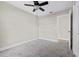 Simple bedroom with ceiling fan and carpet flooring at 2108 Lemon St, Haines City, FL 33844