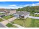 Single-story house with gray siding, solar panels, and a spacious yard at 356 Citrine Loop, Kissimmee, FL 34758