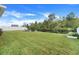 Spacious grassy backyard with a privacy fence at 356 Citrine Loop, Kissimmee, FL 34758