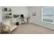 Cozy home office featuring a comfortable chair and built-in desk at 356 Citrine Loop, Kissimmee, FL 34758