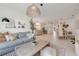 Open concept living room with view to kitchen and dining area at 356 Citrine Loop, Kissimmee, FL 34758