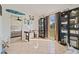 Bright game room with tile floors, a hockey table, and built-in shelving at 3940 Canoe Creek Rd, Saint Cloud, FL 34772