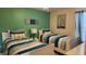 Twin bedroom with nautical-themed bedding at 4317 Acorn Ct, Davenport, FL 33837