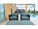 Relaxing patio furniture near a refreshing pool at 4317 Acorn Ct, Davenport, FL 33837