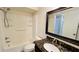 Bathroom with shower/tub combo, granite vanity, and tile floor at 5773 Gatlin Ave # 627, Orlando, FL 32822