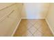 Large closet with wire shelving and tile flooring at 5773 Gatlin Ave # 627, Orlando, FL 32822