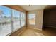 Bright dining area with tile floors and large windows at 5773 Gatlin Ave # 627, Orlando, FL 32822