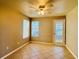 Spacious dining area with tile flooring and French doors at 5773 Gatlin Ave # 627, Orlando, FL 32822