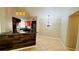 Kitchen features a breakfast bar and stainless steel appliances at 5773 Gatlin Ave # 627, Orlando, FL 32822