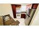 Updated kitchen with stainless steel appliances and granite countertops at 5773 Gatlin Ave # 627, Orlando, FL 32822