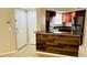Kitchen features granite counters and wood cabinets at 5773 Gatlin Ave # 627, Orlando, FL 32822